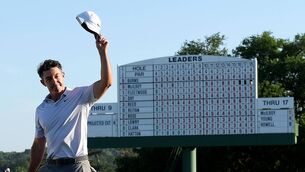<p>NICE DAY'S WORK: Rory McIlroy walks off the 18th green six shots in front at the Masters at Augusta National Golf Club. Pic: Andrew Redington/Getty Images</p> <p>NICE DAY'S WORK: Rory McIlroy walks off the 18th green six shots in front at the Masters at Augusta National Golf Club. Pic: Andrew Redington/Getty Images</p>