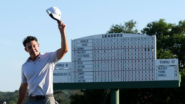 NICE DAY'S WORK: Rory McIlroy walks off the 18th green six shots in front at the Masters at Augusta National Golf Club. Pic: Andrew Redington/Getty Images <p>NICE DAY'S WORK: Rory McIlroy walks off the 18th green six shots in front at the Masters at Augusta National Golf Club. Pic: Andrew Redington/Getty Images</p>