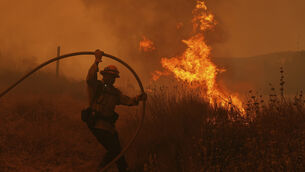<p>Hundreds of firefighters are battling blazes that have devastated over 20,000 hectares of land across France, Portugal, Spain, Greece and other countries.(AP Photo/Marcio Jose Sanchez)</p> <p>Hundreds of firefighters are battling blazes that have devastated over 20,000 hectares of land across France, Portugal, Spain, Greece and other countries.(AP Photo/Marcio Jose Sanchez)</p>