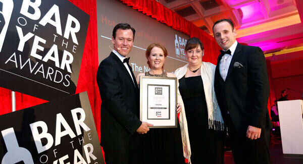 Radio presenter Anton Savage presenting Carmel Lonergan, Avril Ring, and Aaron Mansworth with the Hotel Bar of the Year Award for The Cork International Hotel’s New Yorker Bar. Radio presenter Anton Savage presenting Carmel Lonergan, Avril Ring, and Aaron Mansworth with the Hotel Bar of the Year Award for The Cork International Hotel’s New Yorker Bar.