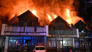 Firefighters work to extinguish a fire that authorities in Hungary say left people dead and injured in Budakeszi, a suburb of Budapest (Hungary’s National Directorate General for Disaster Management via AP) Firefighters work to extinguish a fire that authorities in Hungary say left people dead and injured in Budakeszi, a suburb of Budapest (Hungary’s National Directorate General for Disaster Management via AP)