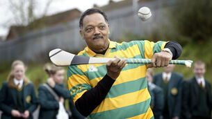 <p>American civil rights campaigner Rev Jesse Jackson trying hurling during his visit to Irish Language School, Meanscoil Feirste in West Belfast in 2004. File picture: Alan Lewis</p> <p>American civil rights campaigner Rev Jesse Jackson trying hurling during his visit to Irish Language School, Meanscoil Feirste in West Belfast in 2004. File picture: Alan Lewis</p>