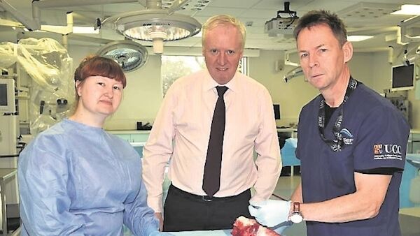 Martin Keogh, right, with Barry O’Reilly, director of Assert, and Carrie O’Flynn, anatomy technician working at Assert in UCC. Picture: Eddie O’Hare.