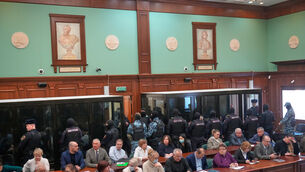 Men tried on the charges of involvement in a terror attack at the Crocus City Hall (Pavel Bednyakov/AP)