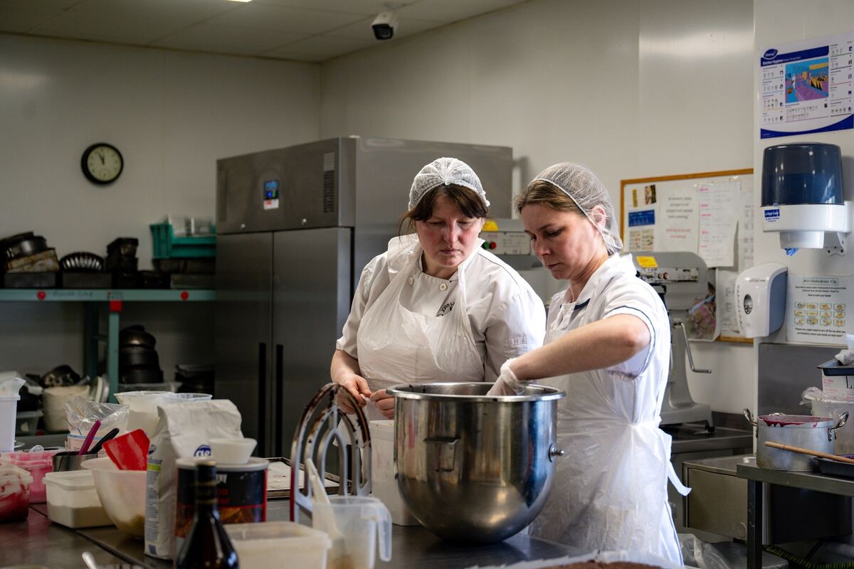 Staff work in the bakery at Duhallow Community Food Services, where Ukrainian bakers displaced by war are part of the team specialising in cakes and sweet treats for the restaurant and catering orders. 