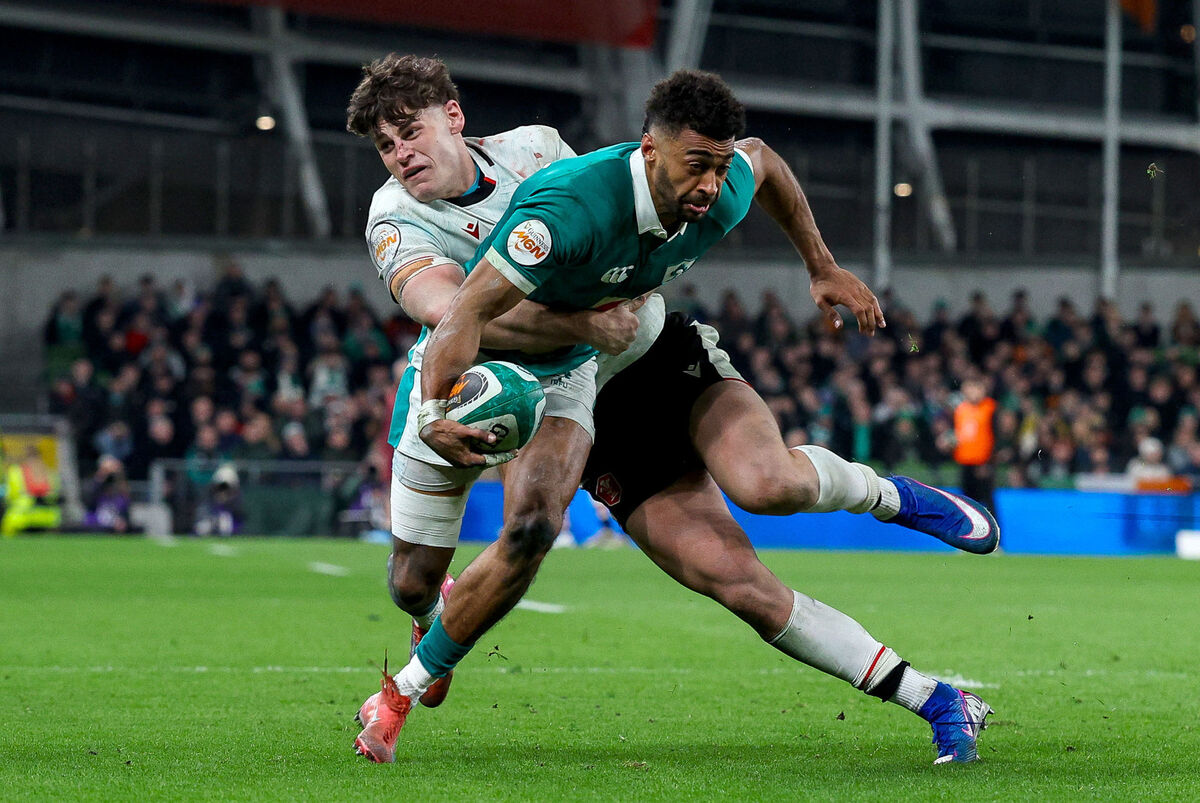 Baloucoune is tackled by Wales' Eddie James. Pic: Ben Brady/Inpho