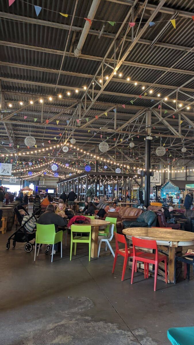 At the Marina Market, the atmosphere at lunchtime was buzzing with families, office workers, teenagers, and visitors enjoying the space. Picture: Monika Jain At the Marina Market, the atmosphere at lunchtime was buzzing with families, office workers, teenagers, and visitors enjoying the space. Picture: Monika Jain