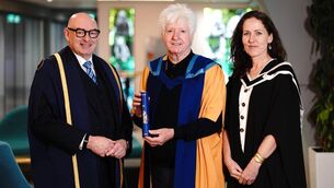 <p> Dónal Gallagher, centre, with John D'Arcy and Tara Craig of the Open University at the conferring at Croke Park on Thursday.  Picture: Paul Moane </p>