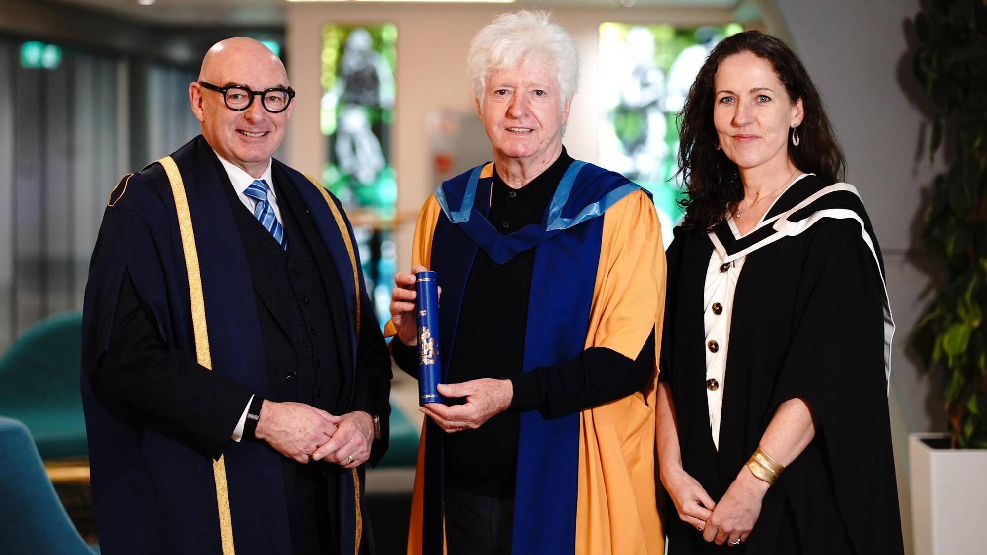  Dónal Gallagher, centre, with John D'Arcy and Tara Craig of the Open University at the conferring at Croke Park on Thursday.  Picture: Paul Moane 