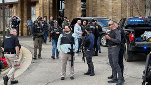 <p>Law enforcement respond to a call at Temple Israel synagogue in West Bloomfield Township, Mich. (AP Photo/Corey Williams)</p>