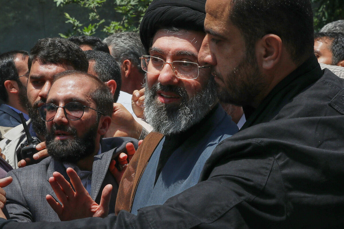 Mojtaba Khamenei, the son of Iran's Supreme Leader, Ayatollah Ali Khamenei, center, attends the annual Quds, or Jerusalem Day, rally in Tehran, Iran, May 31, 2019. (AP Photo/Vahid Salemi)