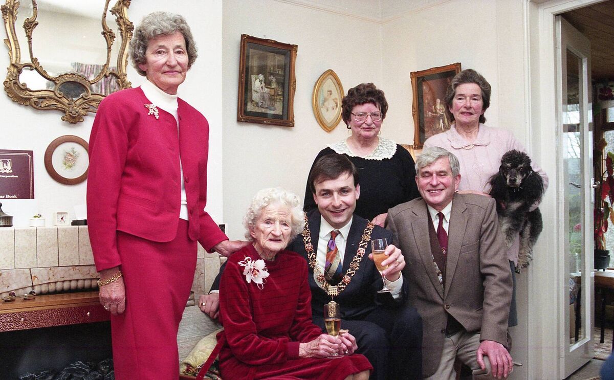 Dorothy Foreman, who was born in Lee Villa, celebrating her 100th birthday with her daughters Pat O'Neill, Rosemarie Kiely, Mary Foreman, her son Adrian Foreman, and the then Lord Mayor of Cork, now Taoiseach, Micheál Martin. March 11 1993 Picture: Cork Examiner
