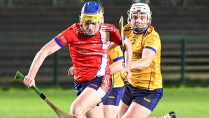 <p> MTU's Cillian McCarthy races past DCU's Cian Doyle during the All-Ireland Junior Hurling final at the MTU sports grounds. Picture: David Keane.</p>