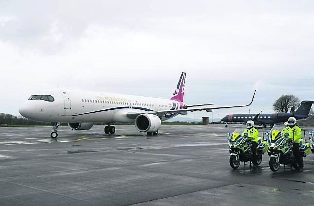 Garda outriders beside the plane carrying Keir Starmer, ready to escort him to the events in Cork. 	Picture: Brian Lawless/PA
                    