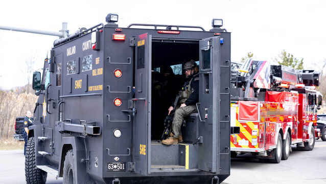 Police respond to the scene of a shooting and vehicle attack near Temple Israel in West Bloomfield, Michigan (Jacob Hamilton/Ann Arbor News via AP)