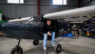 <p>David Murray with the plane he built himself from a Savannah kit, a project that took two and a half years in his garden shed before being moved to the FunFly Aerosports hangar in Offaly for final checks. Picture: Chani Anderson</p>