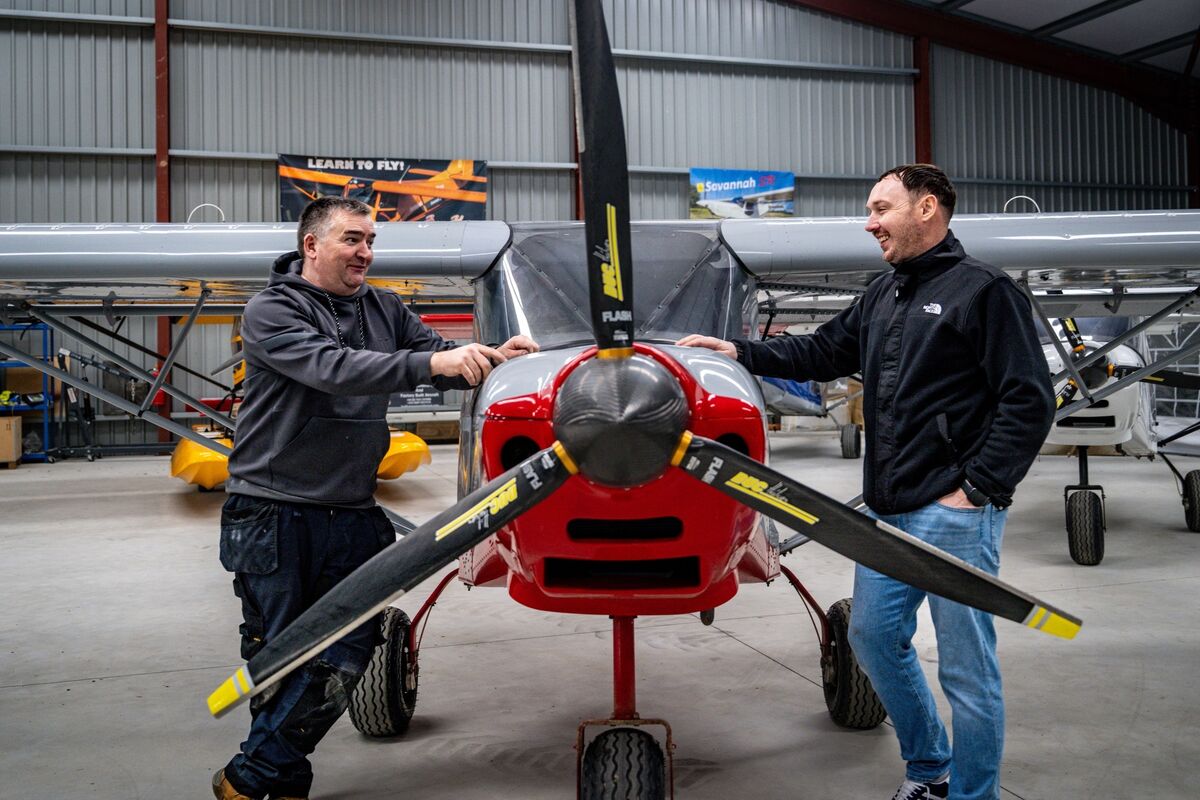 Mark Brereton of FunFly Aerosports with David Murray in the hangar in Offaly. Picture: Chani Anderson