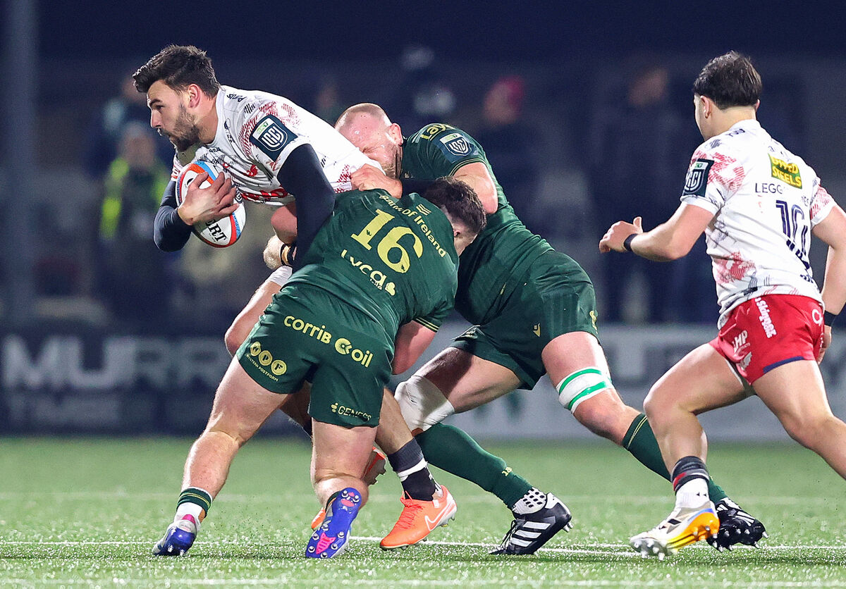 Scarlets Johnny Williams tackled by Eoin de Buitléar and Joe Joyce. Pic: Tom O’Hanlon/Inpho