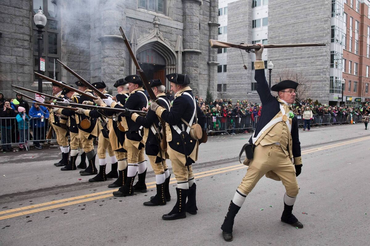American Revolutionary War reenactors fire musket blanks during the annual St. Patrick's Day parade in South Boston, Massachusetts, on March 19, 2017. Picture: DOMINICK REUTER/AFP via Getty Images American Revolutionary War reenactors fire musket blanks during the annual St. Patrick's Day parade in South Boston, Massachusetts, on March 19, 2017. Picture: DOMINICK REUTER/AFP via Getty Images