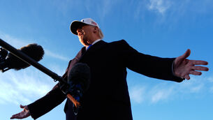 President Donald Trump speaks to reporters before he boards Air Force One for a trip to Florida (Mark Schiefelbein/AP) President Donald Trump speaks to reporters before he boards Air Force One for a trip to Florida (Mark Schiefelbein/AP)