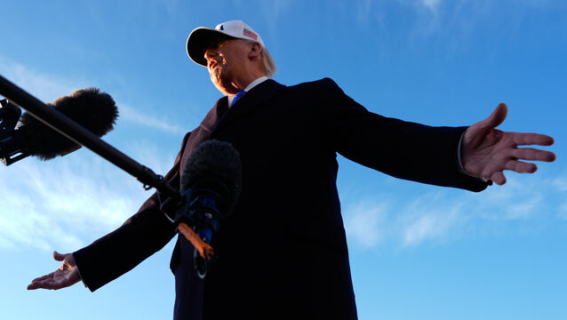 <p>President Donald Trump speaks to reporters before he boards Air Force One for a trip to Florida (Mark Schiefelbein/AP)</p>