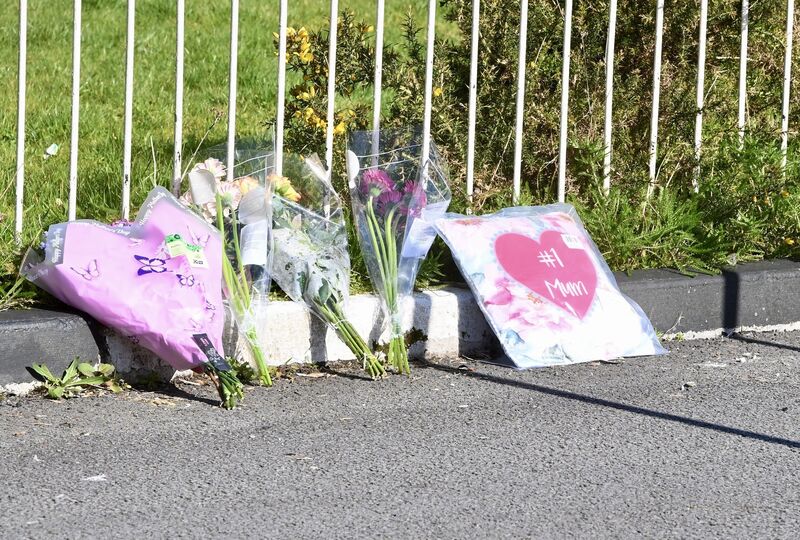 Flowers left at the scene. Picture: Larry Cummins Flowers left at the scene. Picture: Larry Cummins