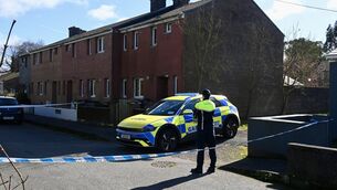 <p> A Garda cordon remains in place at a house at Innishmore Park, Ballincollig Co Cork on Saturday morning after the discovery of the body of a woman on Friday evening. Picture: Larry Cummins</p>