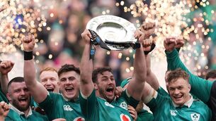 <p>SILVER LININGS: Ireland's Caelan Doris (centre) lifts the Triple Crown trophy with team-mates after the Guinness Men's Six Nations match at the Aviva Stadium in Dublin, Ireland. Pic: Brian Lawless/PA Wire</p>