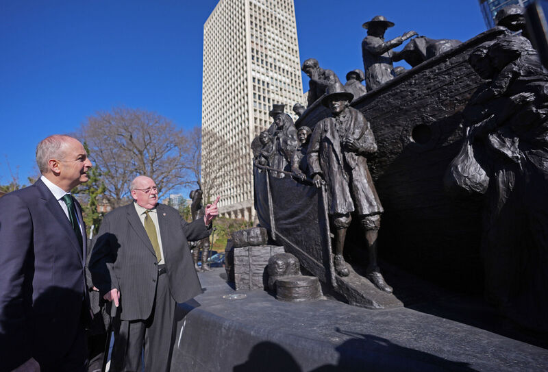 Bob Gessler President of the Irish Memorial Board of Directors speaks to Taoiseach Micheal Martin (left) during a tour of the Irish Memorial in Philadelphia. Picture: Niall Carson/PA Wire