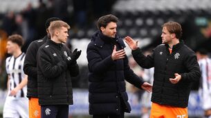 <p>WELL DONE SON: Rangers manager Danny Rohl (centre) celebrates with player Tuur Rommens (right) and others following victory in the William Hill Premiership match at The SMISA Stadium, Paisley. Pic: Andrew Milligan/PA Wire</p>