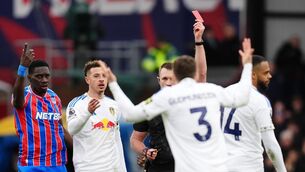 <p>Leeds United’s Gabriel Gudmundsson (second from right) is shown a red card by referee Thomas Bramall against Crystal Palace (John Walton/PA).</p>