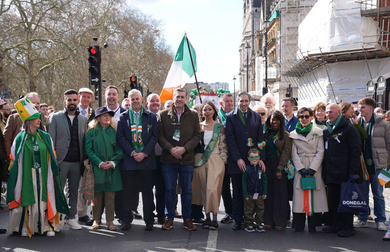 Tanaiste Simon Harris (centre right) during the St Patrick's Day parade in central London. Picture: Lucy North/PA Wire Tanaiste Simon Harris (centre right) during the St Patrick's Day parade in central London. Picture: Lucy North/PA Wire