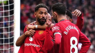 <p>YOU'RE STAYING: Manchester United's Matheus Cunha (left) celebrates scoring their side's second goal of the game with Bruno Fernandes and team-mates during the Premier League match at Old Trafford, Manchester. Pic: Martin Rickett/PA Wire</p>