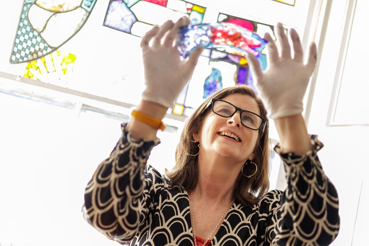  Stained glass artist Colette Langan at work in her studio. Picture: James Connolly