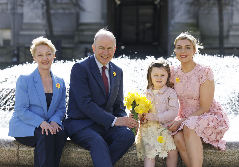 Cancer survivor Katie Foley and her daughter Grace from Inch, County Kerry (right) with Irish Cancer Society CEO Nikki Gallagher and Taoiseach Micheál Martin promoting Daffodil Day on Friday March 20. Picture: Andres Poveda