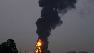 A drone struck a fuel tank forcing the temporary suspension of flights at Dubai International Airport (AP Photo)