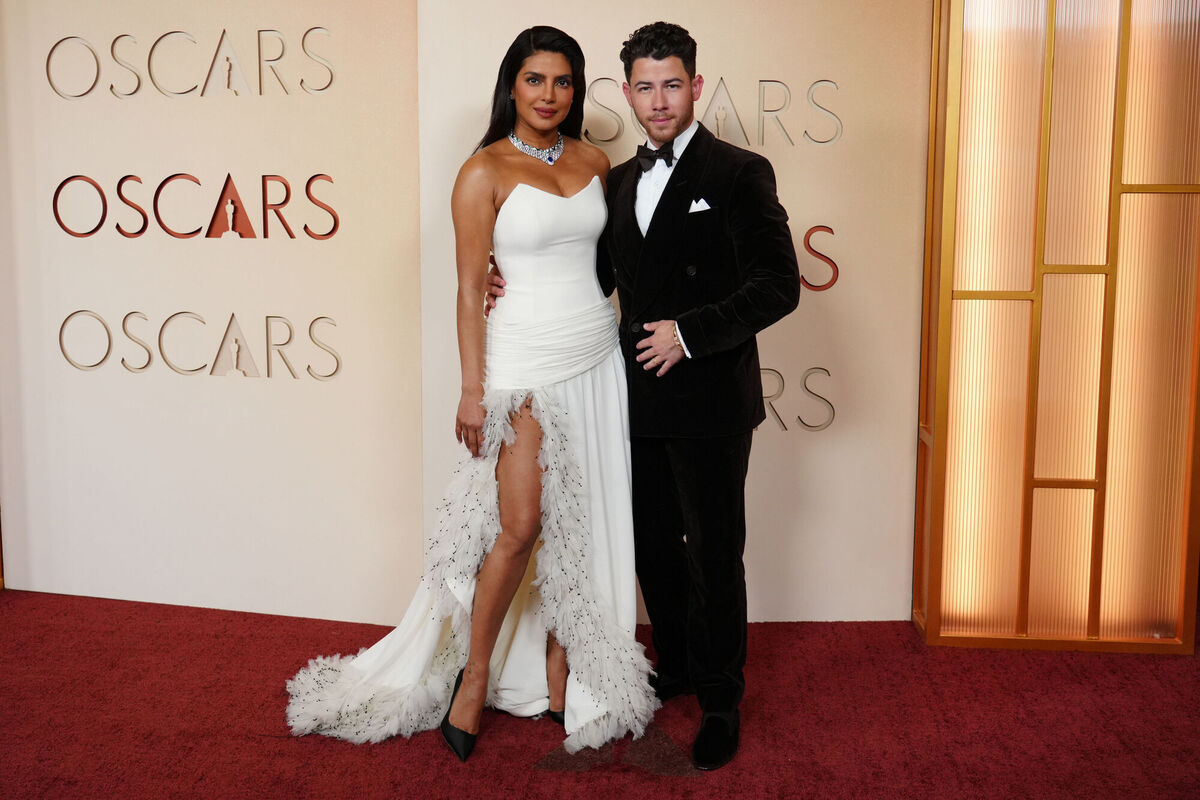 Priyanka Chopra, left, and Nick Jonas arrive at the Oscars. Picture: Jordan Strauss/Invision/AP. Priyanka Chopra, left, and Nick Jonas arrive at the Oscars. Picture: Jordan Strauss/Invision/AP.