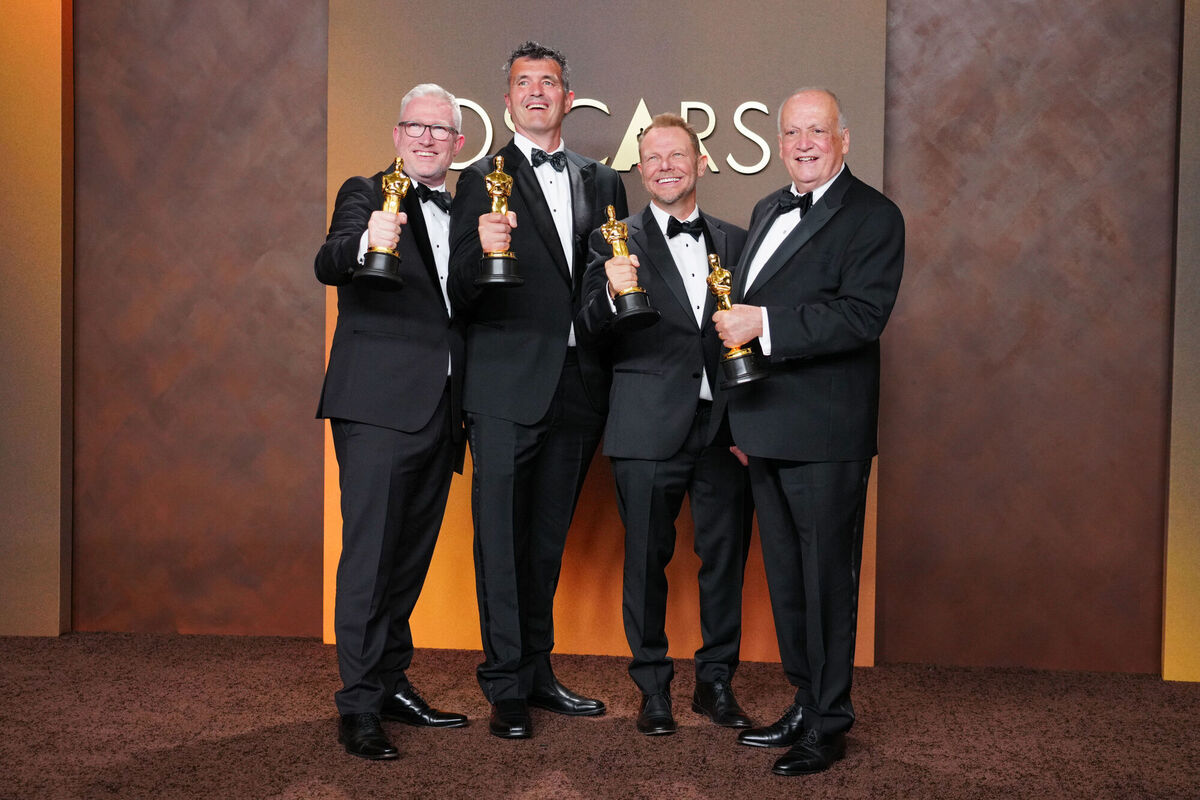 Daniel Barrett, from left, Eric Saindon, Richard Baneham, and Joe Letteri, winners of the award for visual effects for Avatar: Fire and Ash. Picture: Jordan Strauss/Invision/AP.