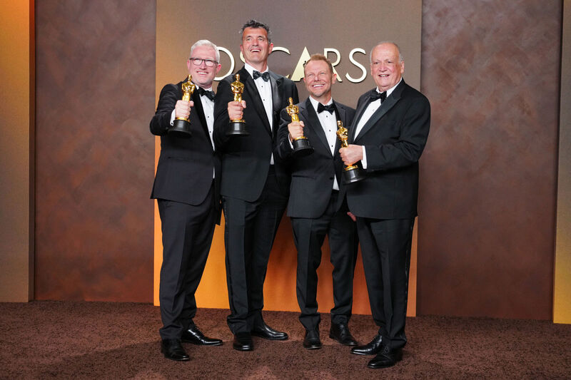 Daniel Barrett, from left, Eric Saindon, Richard Baneham, and Joe Letteri, winners of the award for visual effects for Avatar: Fire and Ash. Picture: Jordan Strauss/Invision/AP.