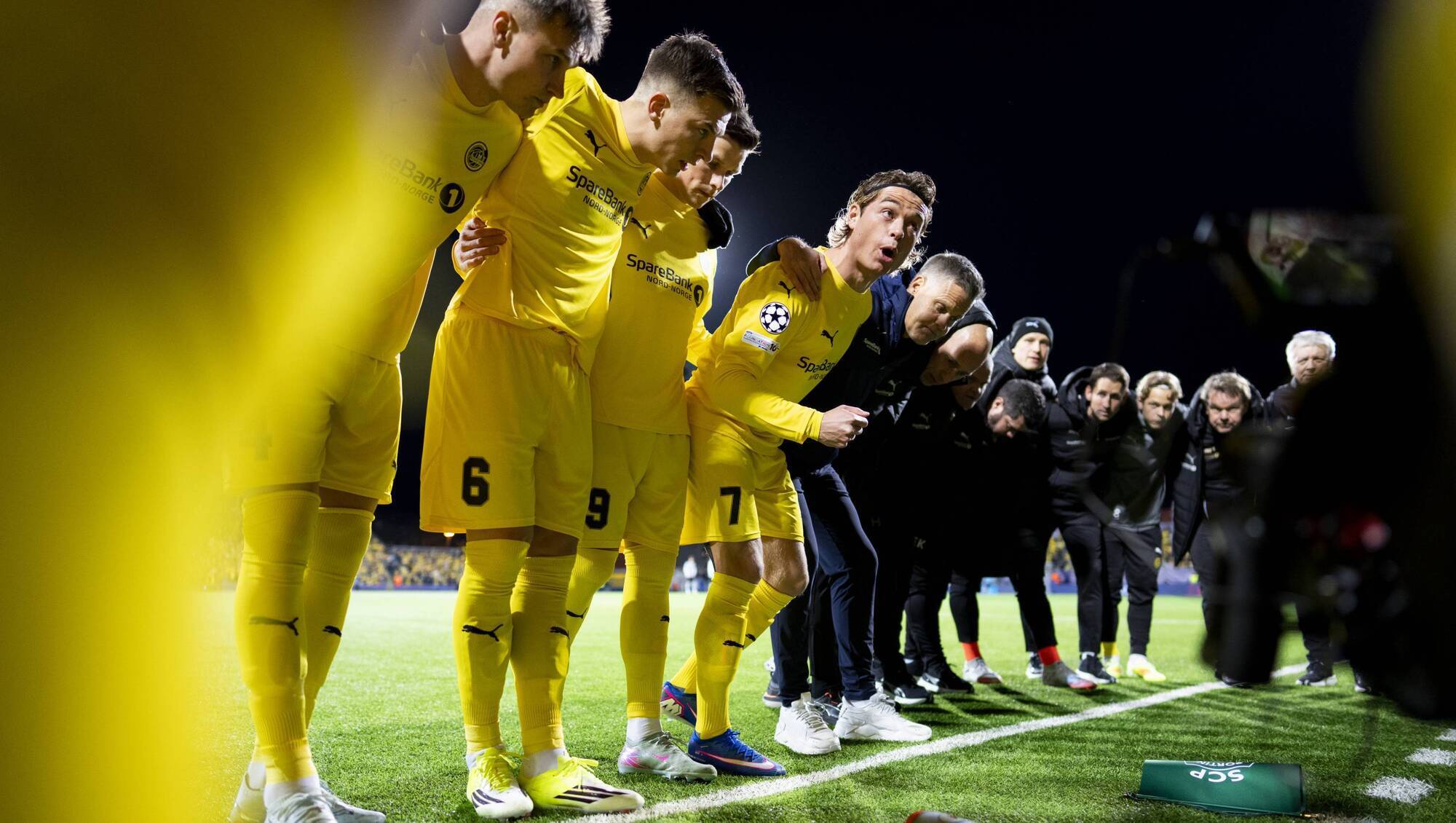 TOGETHER: Patrick Berg, Sondre Brunstad Fet, Kjetil Knudsen and Jostein Gundersen of Bodo/Glimt before kick off during the UEFA Champions League Round of 16 First Leg match clash with Sporting Clube de Portugal at Aspmyra Stadium on March 11, 2026 in Bodo, Norway. (Photo by Martin Ole Wold/Getty Images)