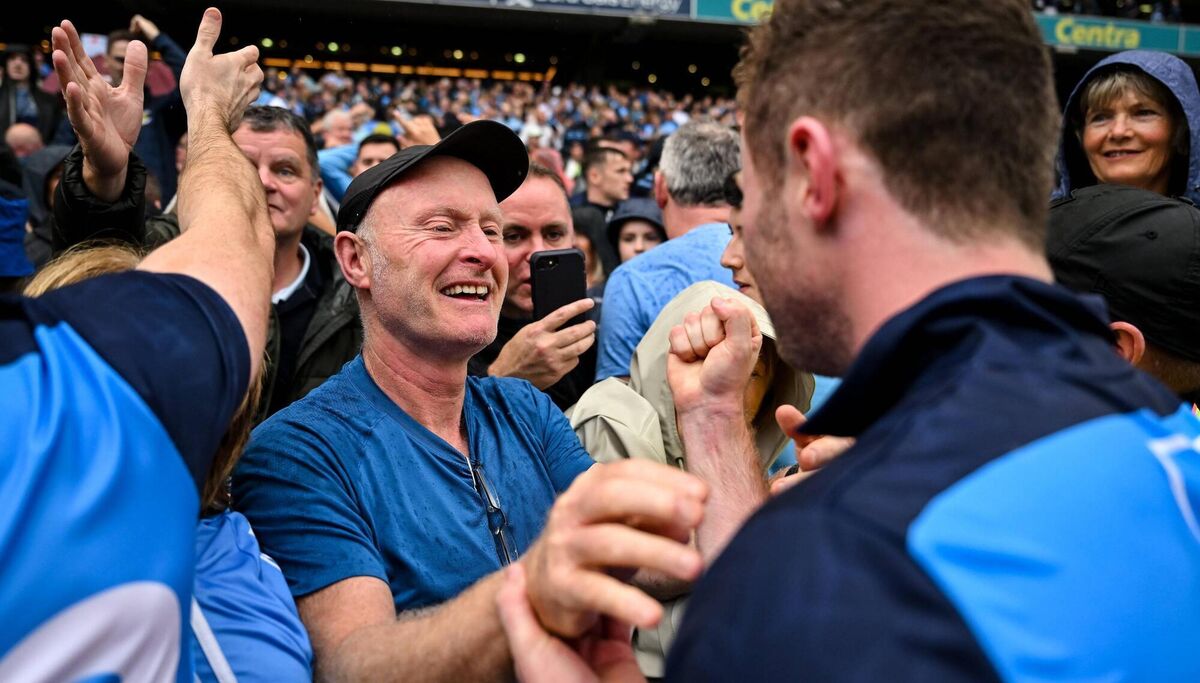 Former Dublin footballer Dr Noel McCaffrey celebrates with his son Jack after an All-Ireland victory. Pic: Brendan Moran/Sportsfile