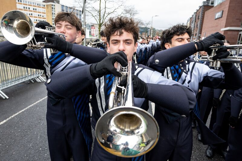 Trumpeters from the Texas McKinney High School Royal Pride Band prepare to perform at the meeting point ahead of the St Patrick’s Day Parade in Cork city. Picture: Chani Anderson