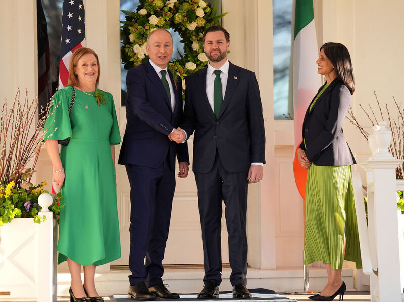 Taoiseach Micheal Martin and wife Mary O'Shea are greeted by US vice president JD Vance and wife Usha Vance before a breakfast at the Naval Observatory in Washington DC. Picture: Niall Carson/PA