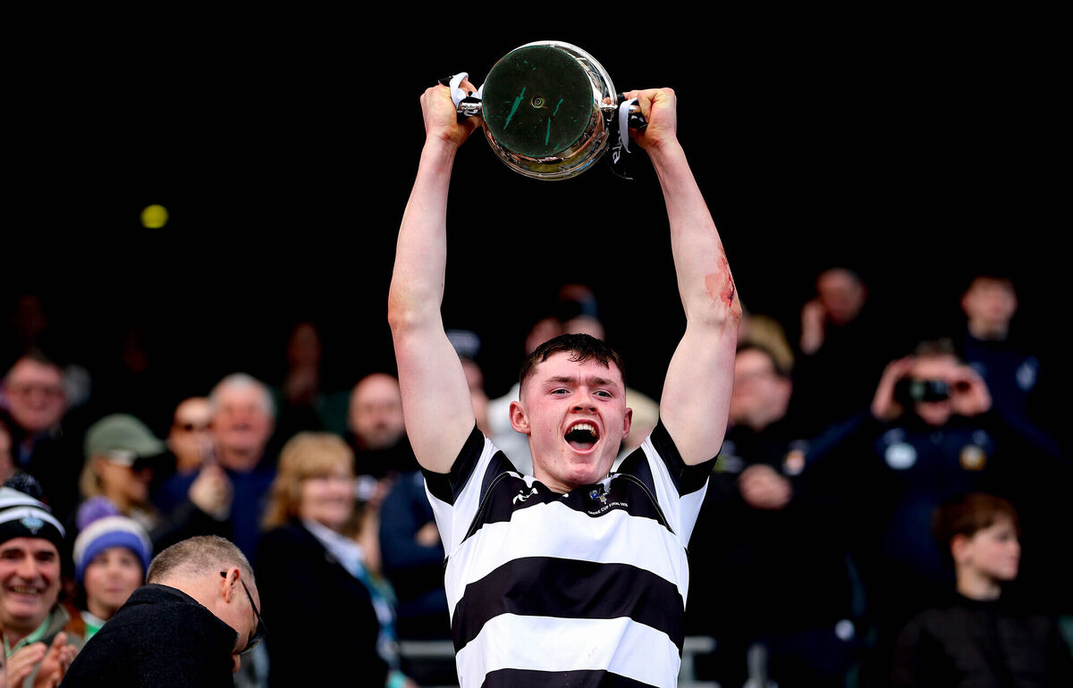 St. Kieran's David Barcoe lifts the trophy. Pic: Ryan Byrne/Inpho