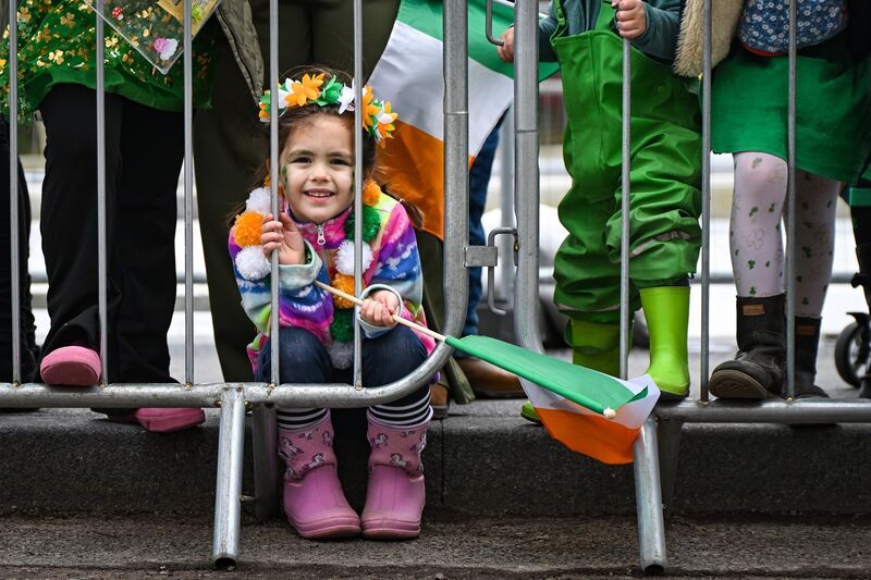 Clara, who recently moved to Cork with her family from North Carolina, gets a front row view of her first St Patrick’s day parade in Cork city. Picture: Chani Anderson