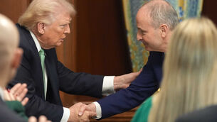 <p>US president Donald Trump and Taoiseach Micheál Martin shake hands during this year's St Patrick's Day events in Washington DC. Picture: Niall Carson/PA</p>