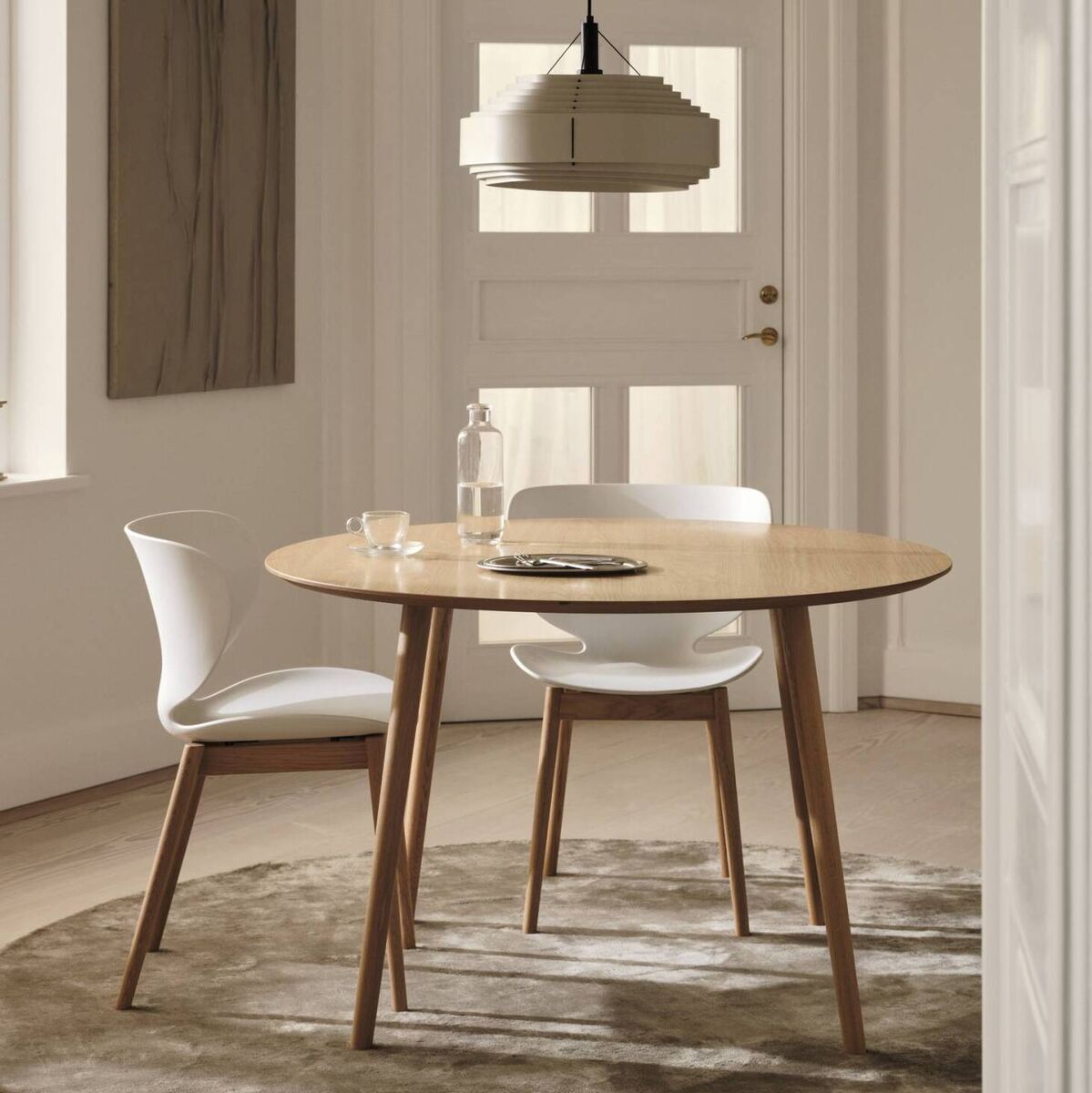 Bornholm dining table in natural oak veneer, €699, and Hamilton chairs, €299 each, BoConcept. Bornholm dining table in natural oak veneer, €699, and Hamilton chairs, €299 each, BoConcept.