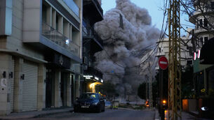 <p>Smoke rises from a building following an Israeli strike in central Beirut, Lebanon, Wednesday, March 18, 2026. (AP Photo/Hussein Malla)</p>