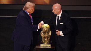<p>US President Donald Trump is presented with the inaugural FIFA Peace Prize award by FIFA President Gianni Infantino. Pic: Sam Corum/PA Wire.</p>