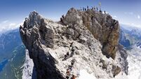 Germany, Group of hikers hiking on Zugspitze mountain